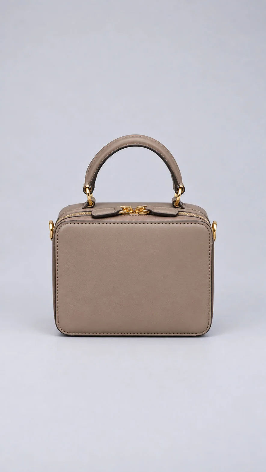 HB1008 taupe leather mini box bag with top handle and gold zippers, front view
